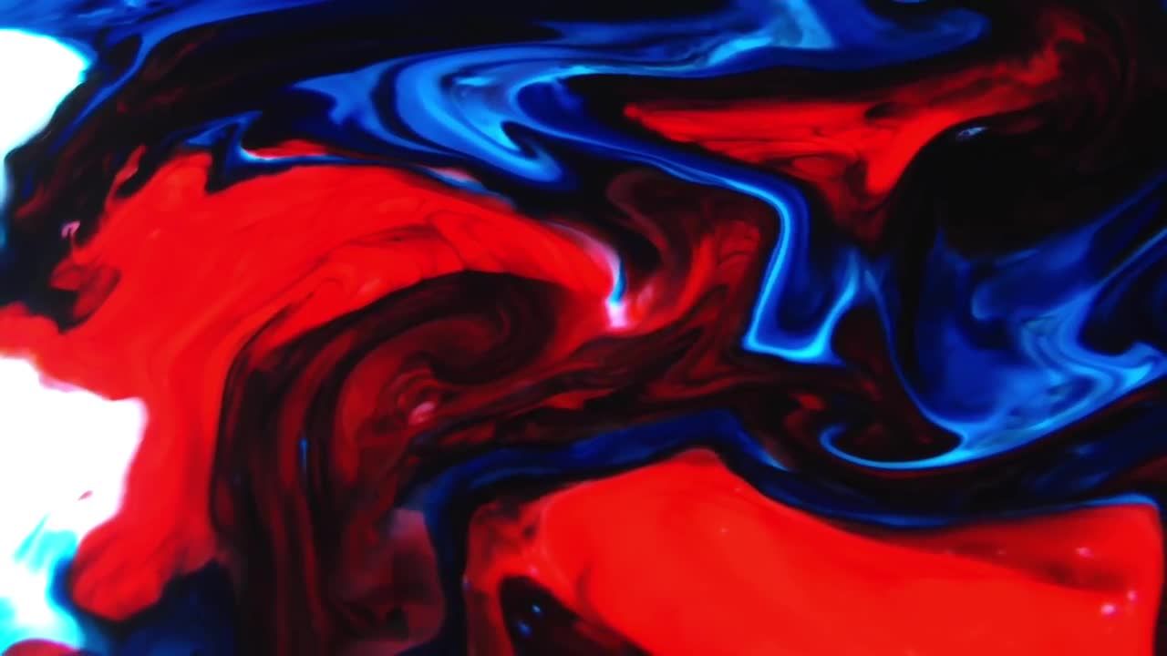 漂亮设计的红蓝相间的油漆旋涡视频特效