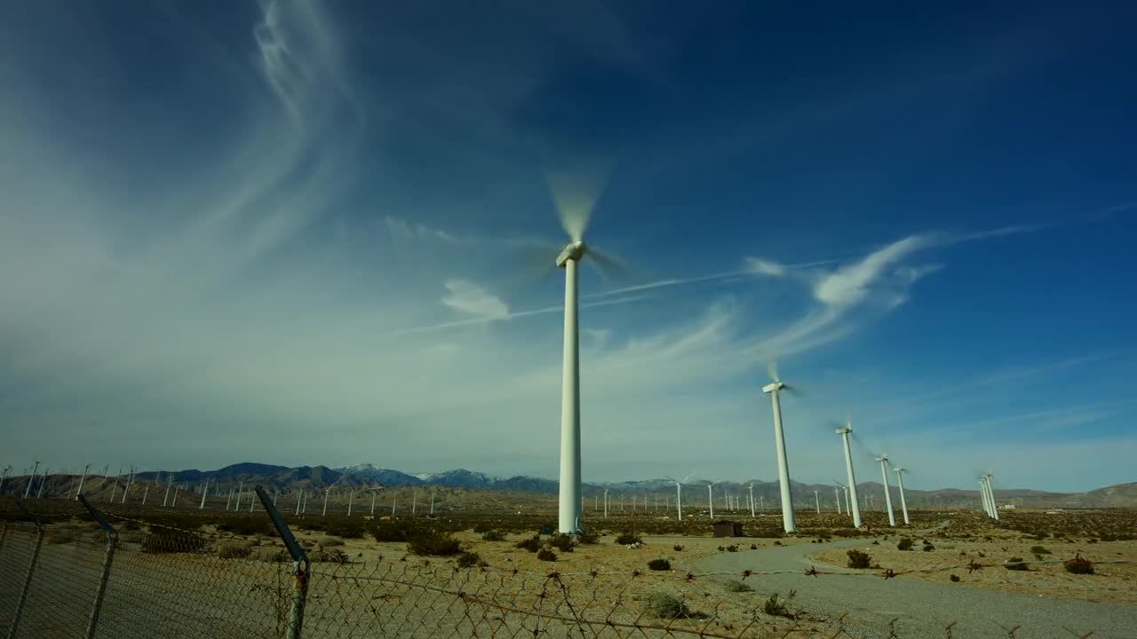 乡下田野风车上空飘动的云视频素材