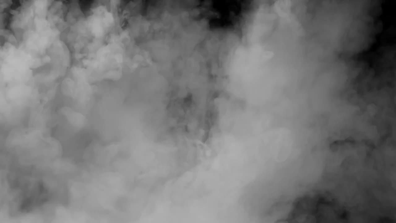 黑色背景下降的白色气体烟雾视频素材